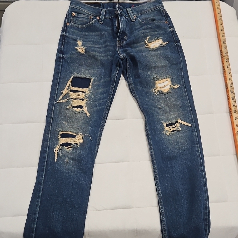 Levi's women's Dustressed Ripped Blue Wash Skinny Jeans